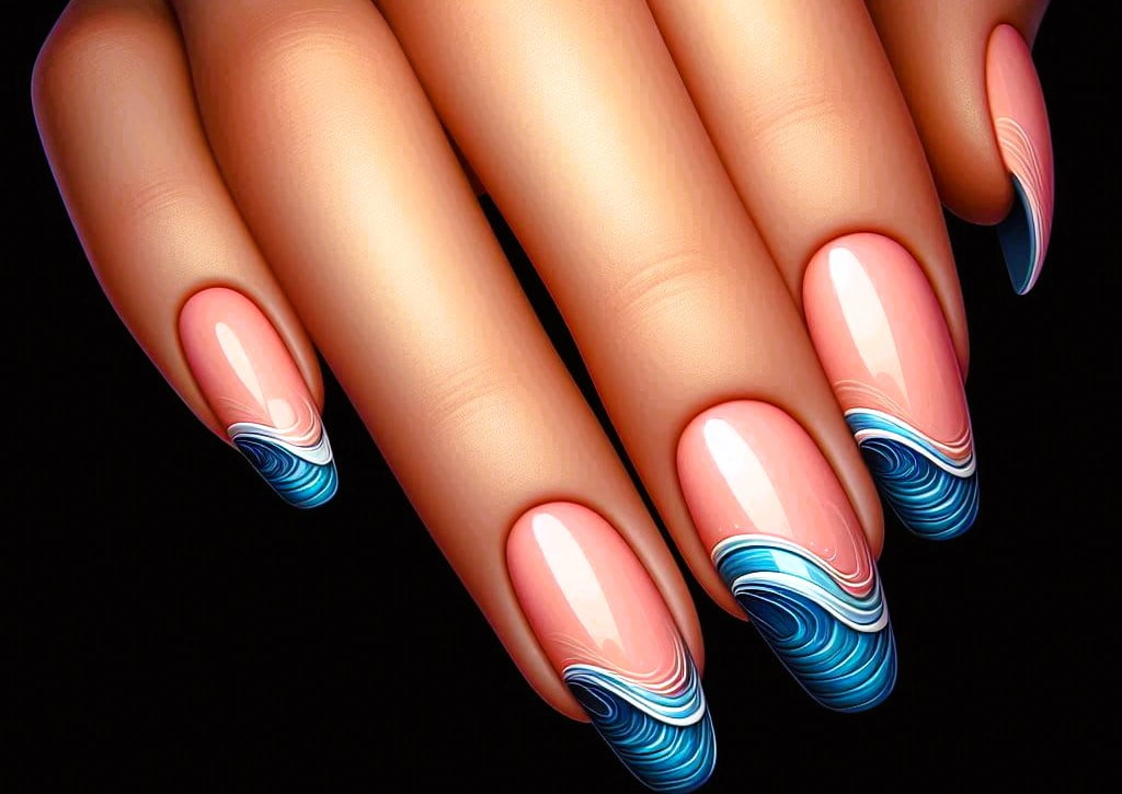 Light pink nails with blue wave patterns on the tips.