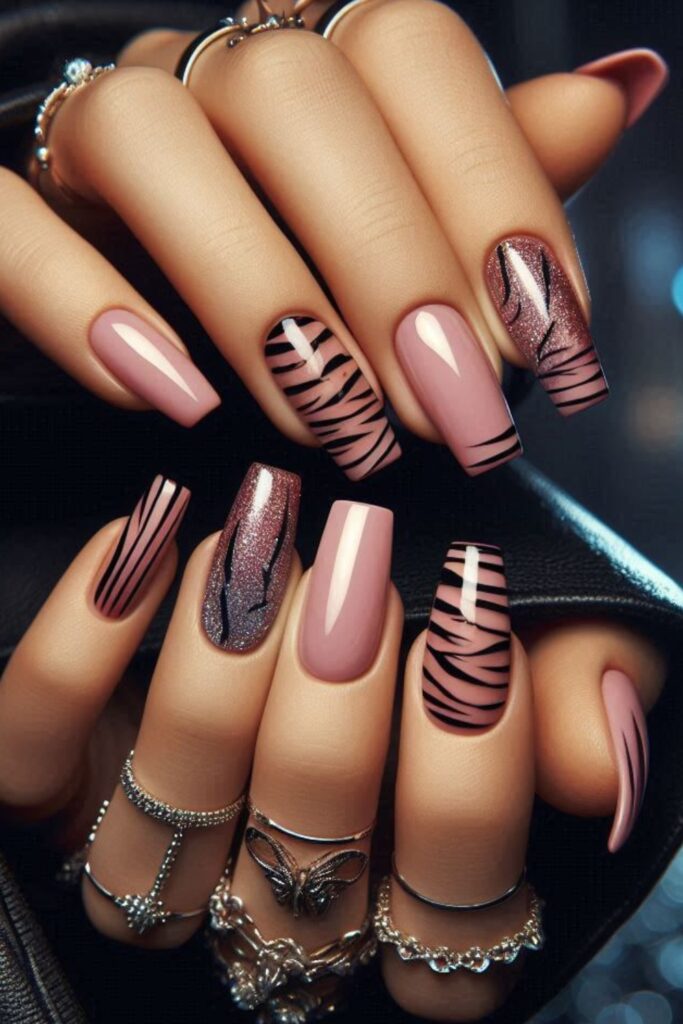 Nails with a light pink base and fierce black tiger stripes, set in a stylish, urban night out scene